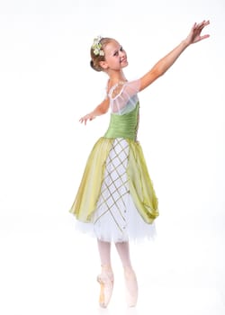Beautiful young ballerina on a white background