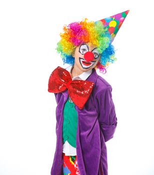 Portrait of a cute boy clown. Isolated on white background.