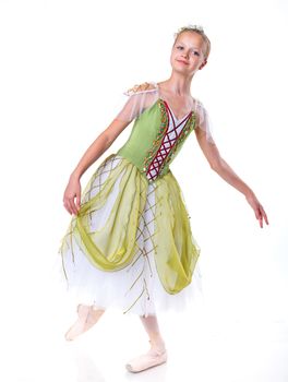 Beautiful young ballerina on a white background