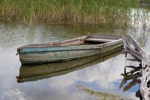 An old boat off the coast of lake