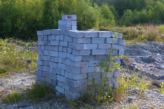 A stack of grey bricks for construction