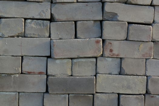 Background old gray brick in a stack