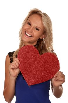 Lovely blond girl hold a shiny red heart for valentines day on isolated white