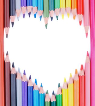 Shape Heart of Sharpened Multi Colored Pencils isolated on white background