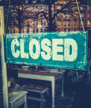 Retail Image Of Grungy Vintage Closed Sign In Furniture Boutique Store