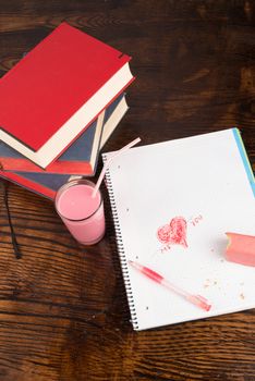 Notebook with romantic scribblings, a  Valentines day still life