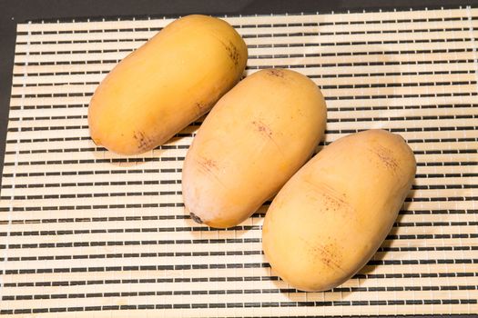 Potatoes on wooden floor