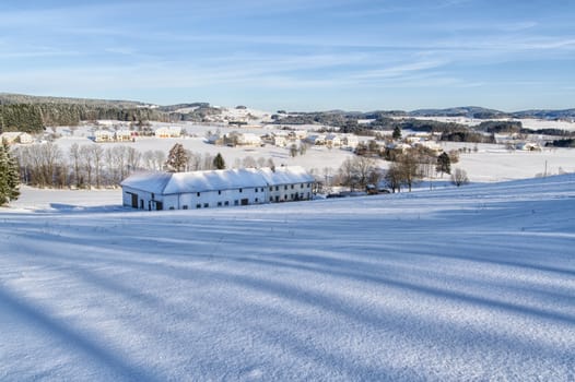 Farm in a winter landscape, taken in upper austria