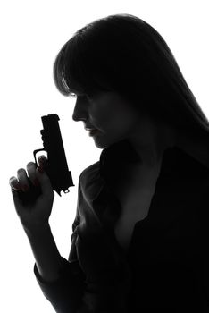 one caucasian sexy detective woman holding gun in silhouette studio isolated on white background