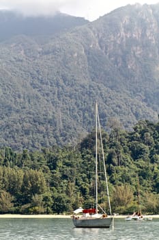 Yatch anchored with hill background