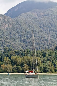Yatch anchored with hill background