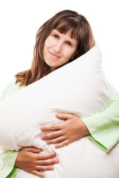 Beauty young smiling caucasian woman hand holding pillow for rest and sleep white isolated