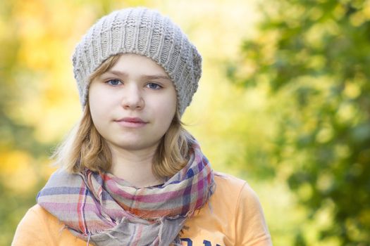 young girl in the autumn park - portrait