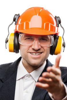 Businessman in black suit and safety hardhat helmet gesturing hand greeting or meeting handshake white isolated
