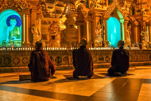 Shwedagon Pagoda in Yangon City, Burma with Beautiful Evening Light: the beautiful golden pagoda, the oldest historical pagoda in Burma and the world, in the evening with great evening light.