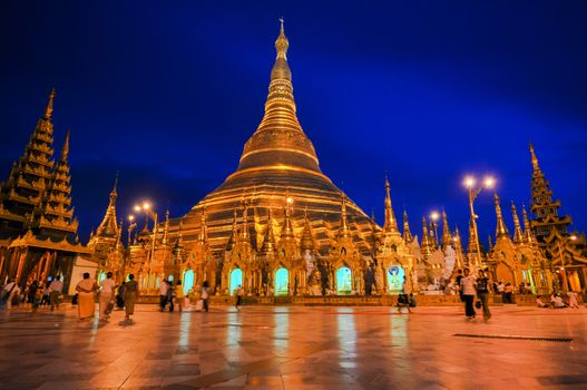 Shwedagon Pagoda in Yangon City, Burma with Light: the beautiful golden pagoda, the oldest historical pagoda in Burma and the world, in the evening with great evening light.
