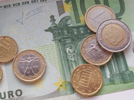 Euro (EUR) banknotes and coins money useful as a background or money concept