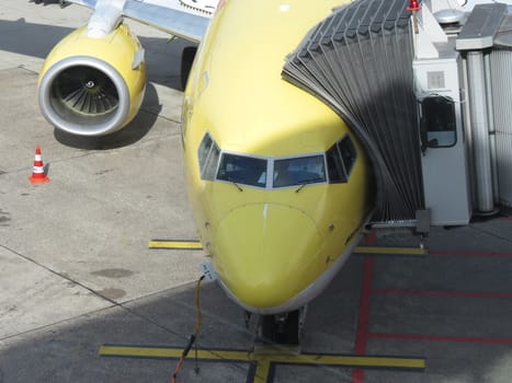 airplane parked at the airport ready for boarding