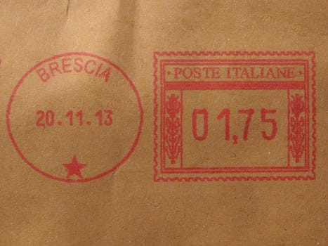 Postage meter from Brescia (Italy) printed with red ink over light brown envelope