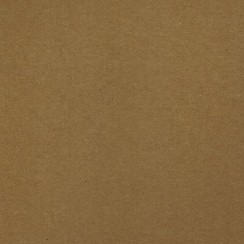 Brown corrugated cardboard sheet useful as a background