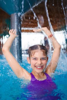 Activities on the pool. Cute girl in swimming pool