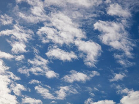 Blue sky with white clouds useful as a background