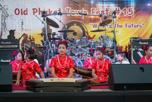 PHUKET, THAILAND - 07 FEB 2014: Unidentified musician(s) play on a stage during annual old Phuket town festival. 