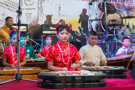 PHUKET, THAILAND - 07 FEB 2014: Unidentified musician(s) play on a stage during annual old Phuket town festival. 
