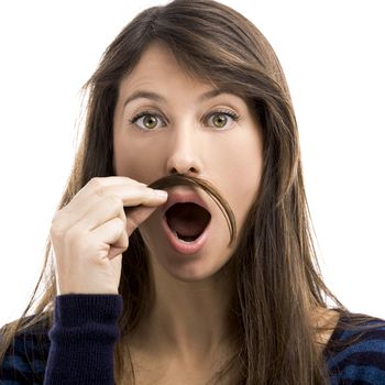 Portrait of a funny woman making a moustache with her own hair