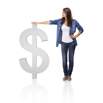 Beautiful woman standing over a Dollar symbol, isolated over a white background