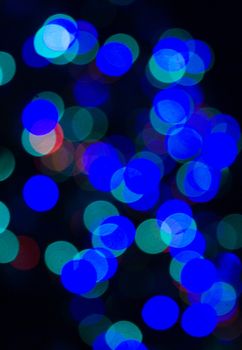 Glitter of color christmas lighting background.