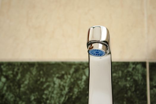 Silver Water Tap in the Bathroom