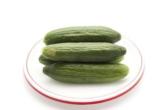Fresh Green Cucumber on Plate