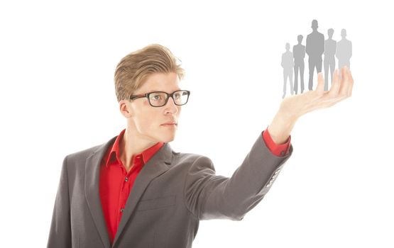 Young student holding an illustration of business group isolated on white background