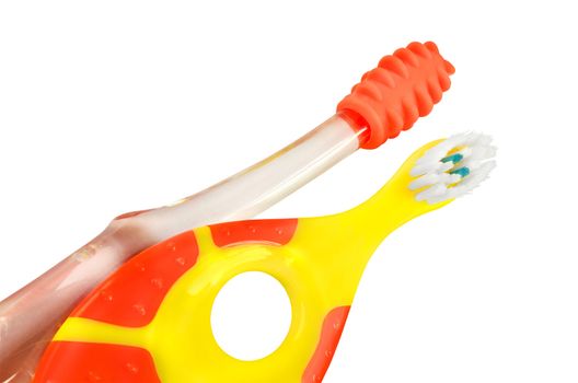 Two kind of small teeth brushes for children. One for cleaning and another for gum massage during teething.
