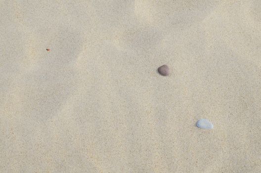 Little Rocks on Sandy Beach