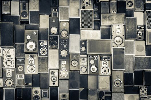 Music speakers hanging on the wall in monochrome vintage style