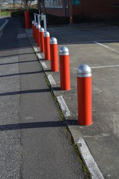 Steel security bollards in front of buildings to prevent crime and terrorism threats.