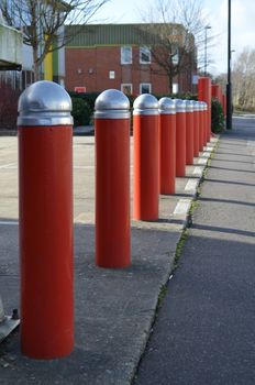 Steel security bollards outside buildings to prevent crime and terrorism threats.