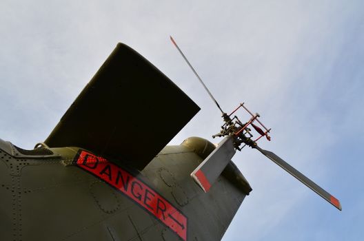 Rear rotor blades belonging to a military helicopter.