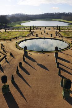 The orangery park of the castle of Versailles in alignment with the water part of the Swiss