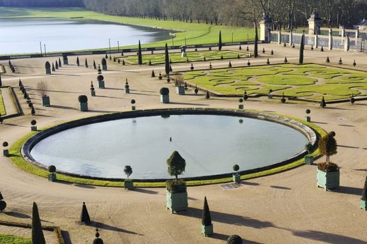 The orangery park of the castle of Versailles in alignment with the water part of the Swiss