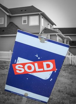 Real Estate Image Of A Sold Sign Beside A New Built Home