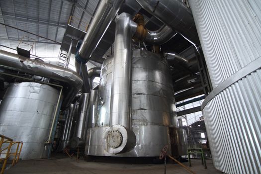 evaporator tanks in a sugar mill
