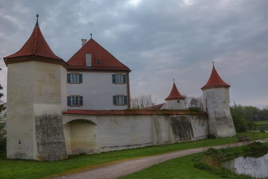 The castle was built between two arms of the River Wurm for Duke Albert III, Duke of Bavaria in 1438–39 as a hunting-lodge, replacing an older castle burned down in war.
