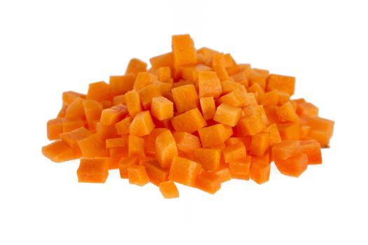 Chopped raw carrots isolated on white background.