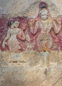 Millennium-old slab of rock with decoration at Sri Naheshwara in Bangalore. Worn off colors remain.