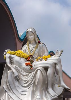 The Peita statue shows Mother Mary holding the dead Jesus in front of the Saint Mary's Basilica in Bengaluru.