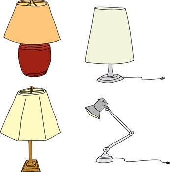 Group of four modern table lamps on white background