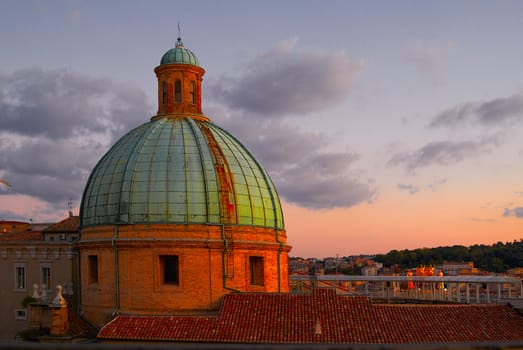 dome of Cathedral  under golden rays of setting sun Ancona Italy